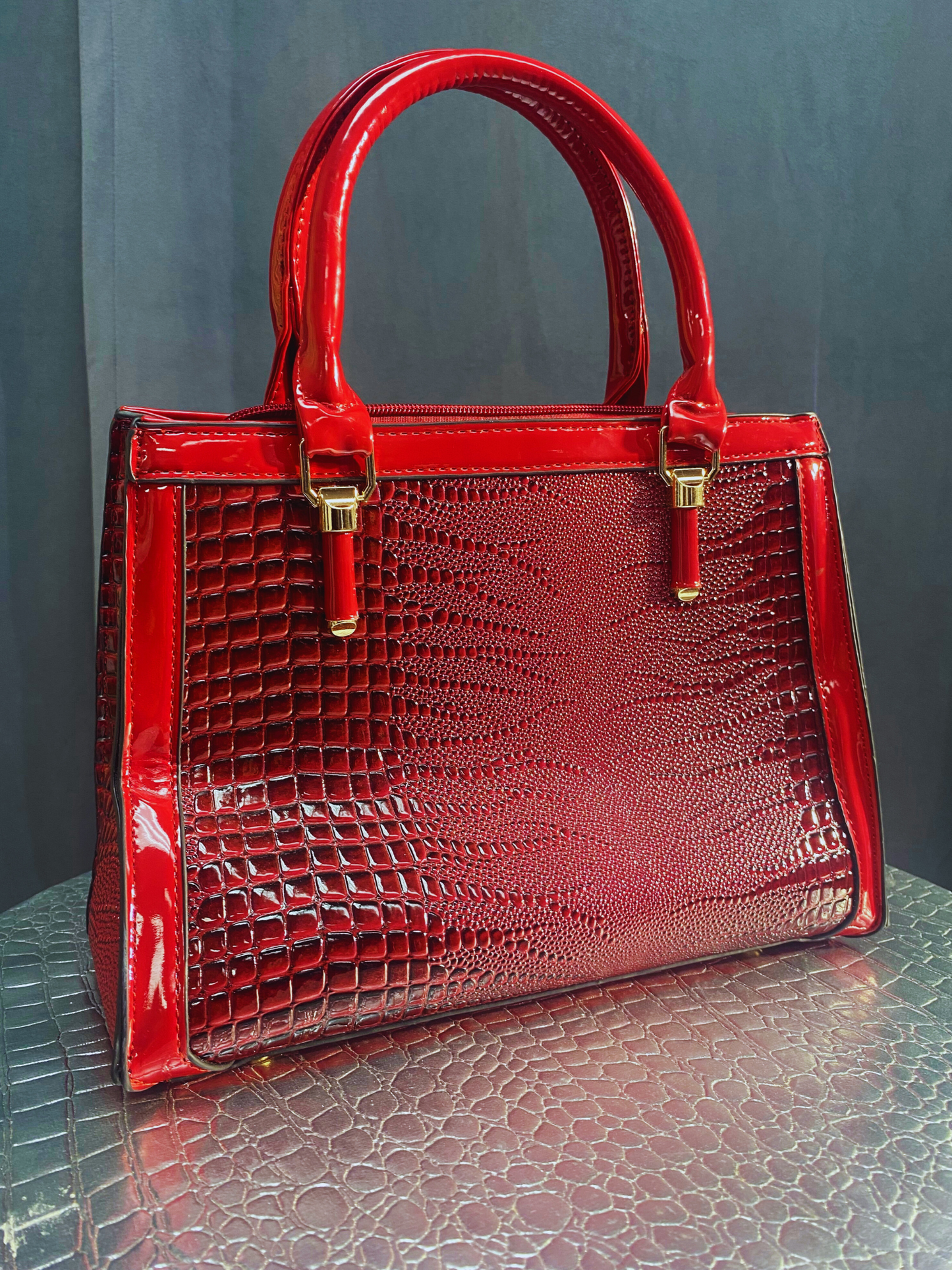 Red crocodile print purse