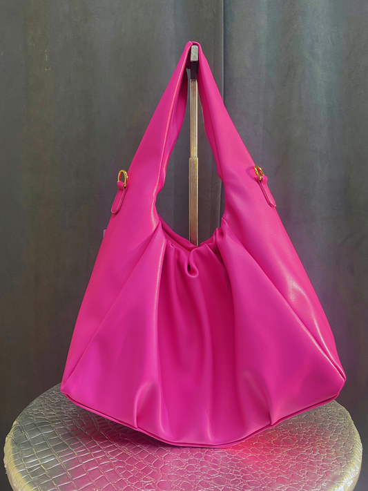 Unique hot pink purse with gold accents