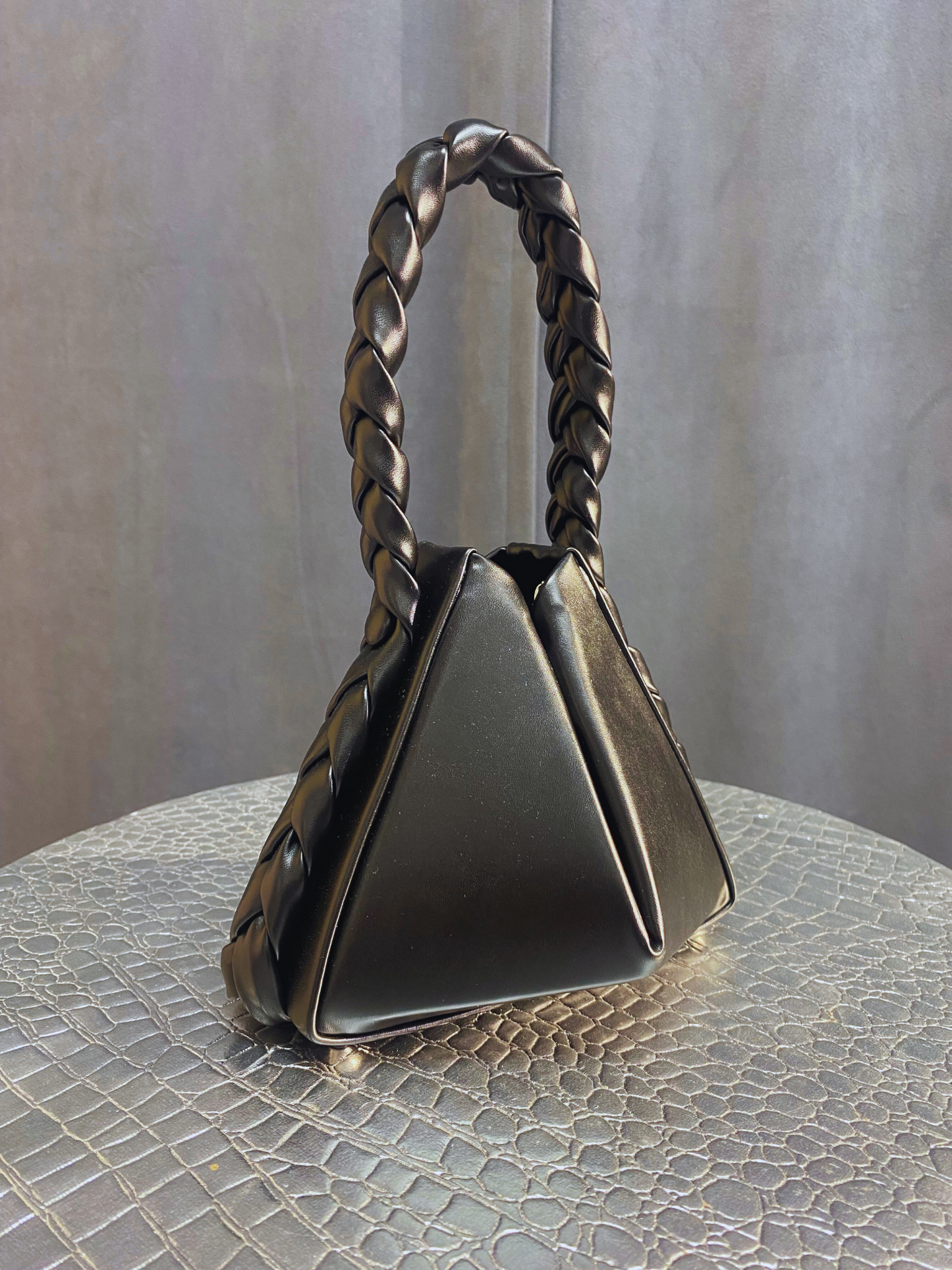 Unique triangle shaped black bag with braided strap - small